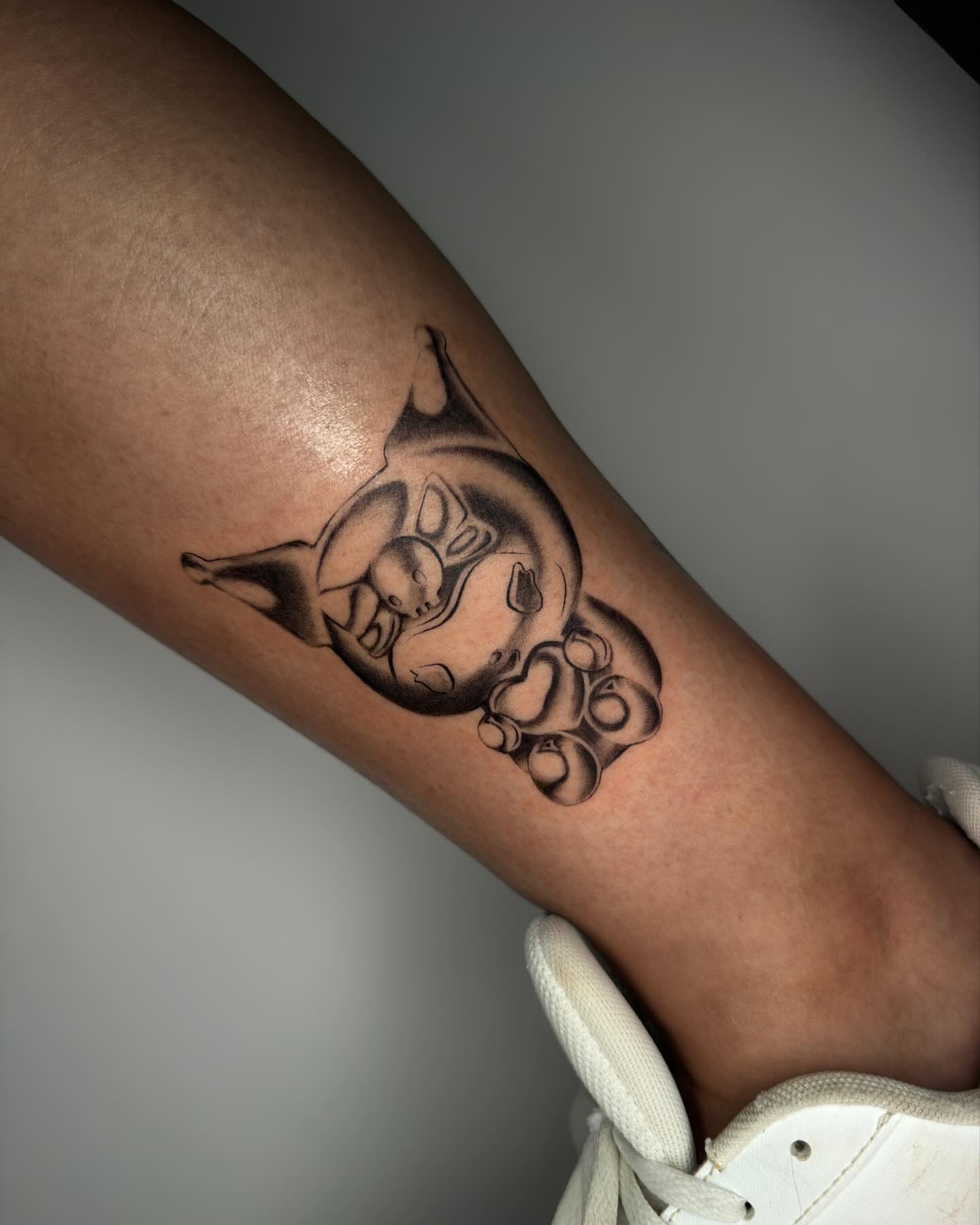 Octopus black and grey tattoo on the forearm by Mel