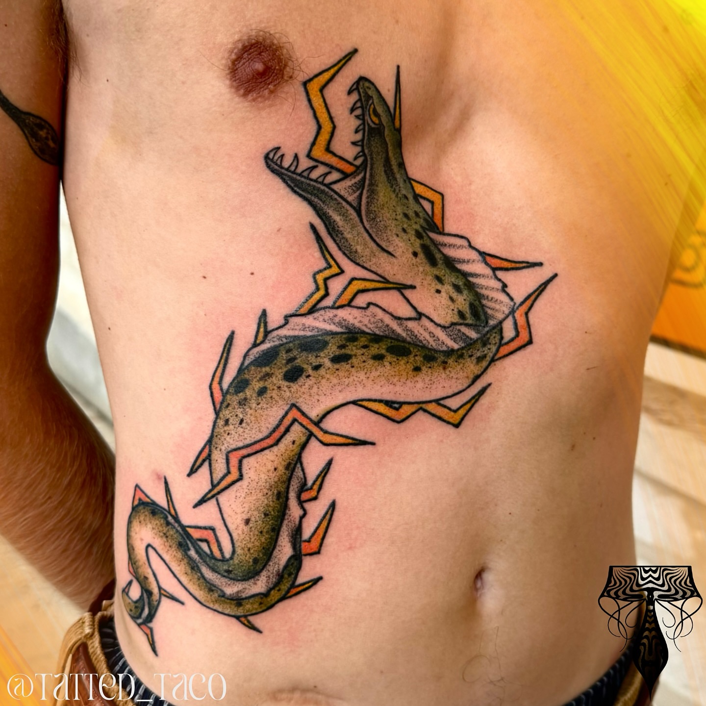Fish American traditional tattoo on the ribs by Ray Arce๐