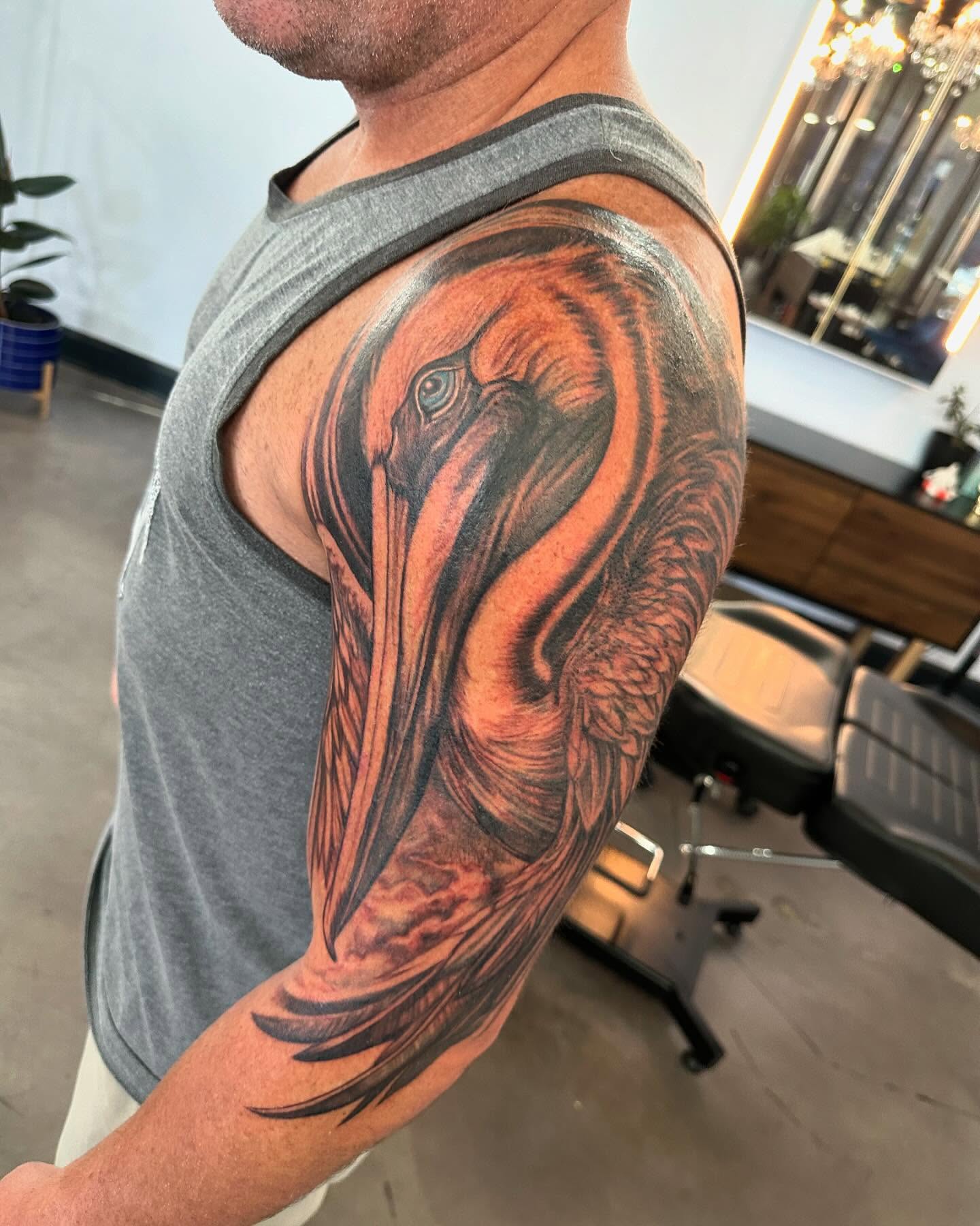 Heron realism tattoo on the upper arm by Cameron Hobbs, Woodbridge, Virginia