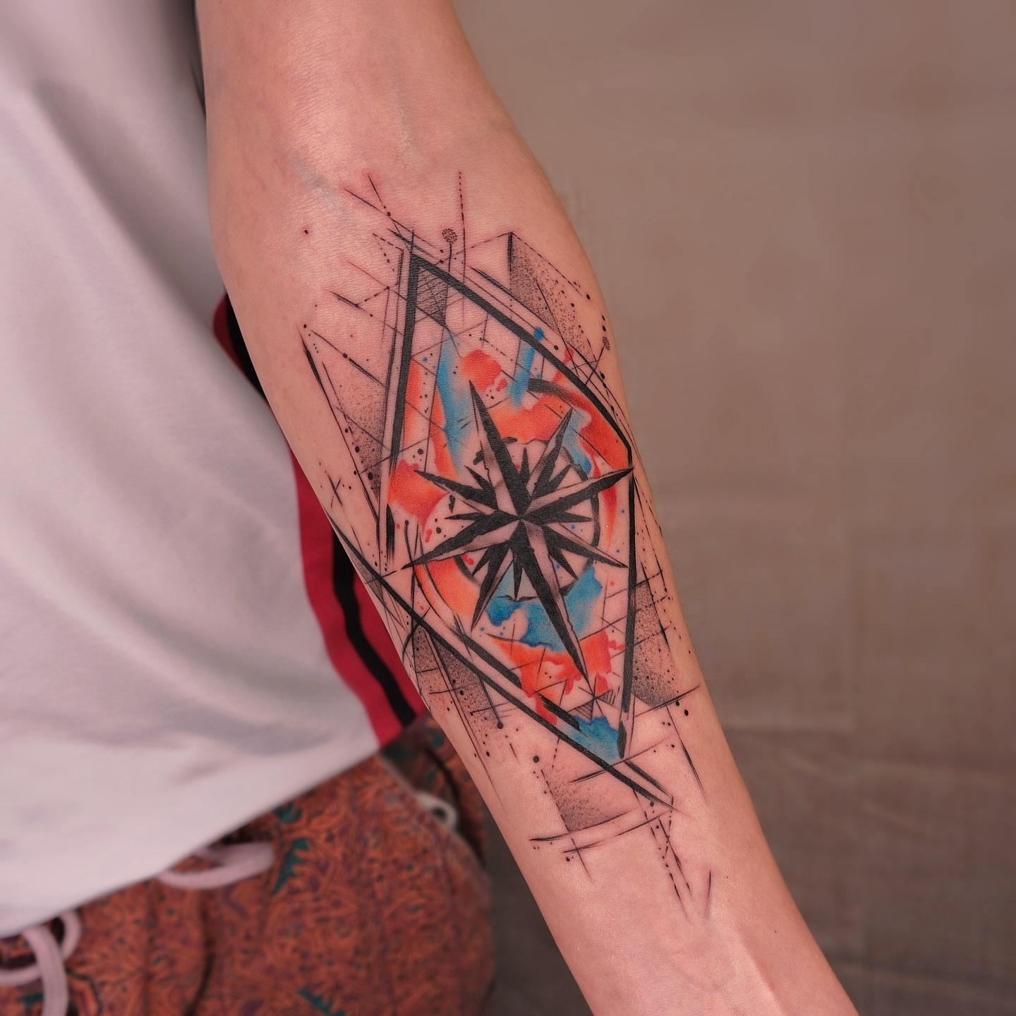 Compass geometric tattoo on the forearm by Houston Tattoo Artist