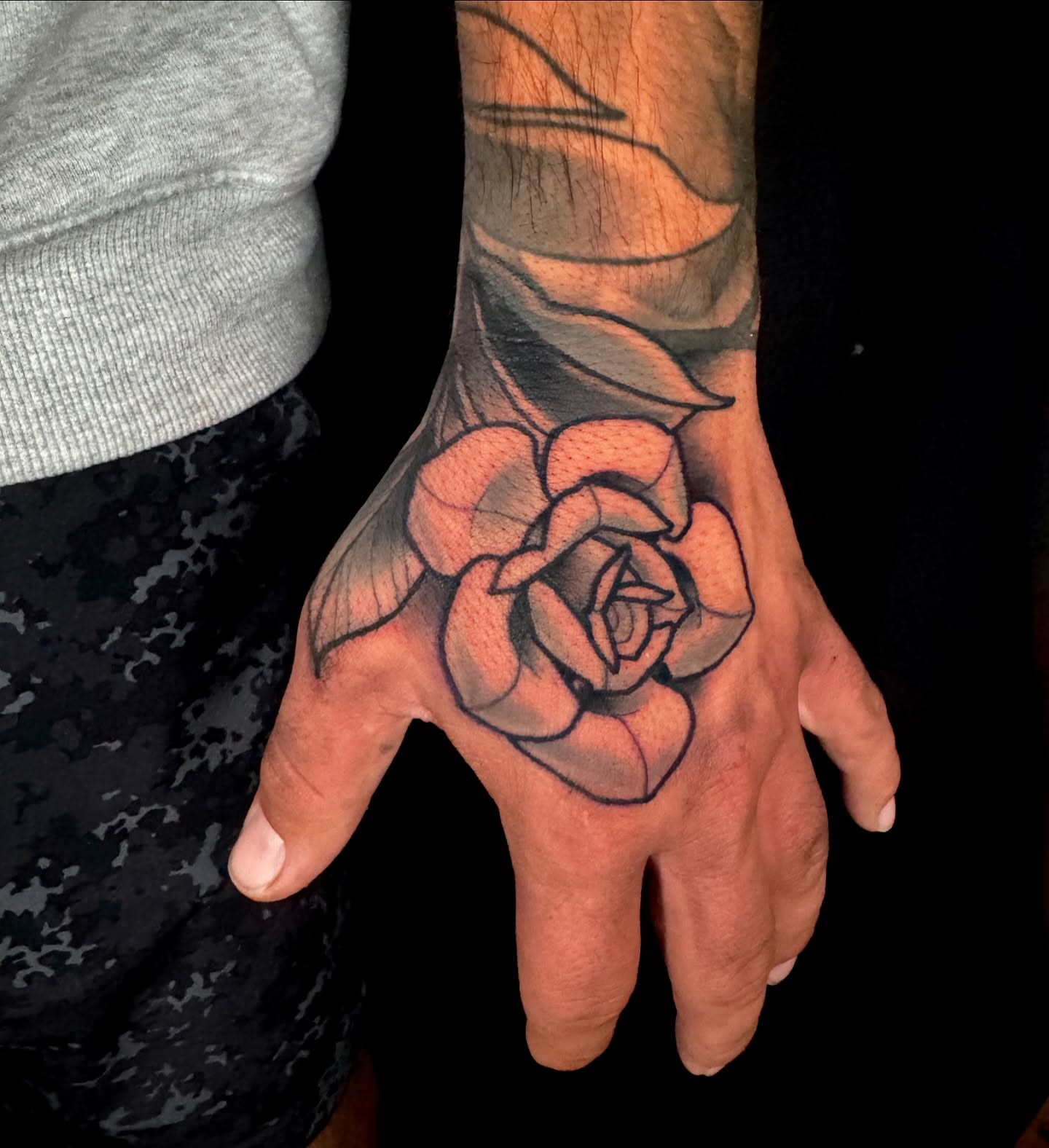 Rose realism tattoo on the hand by Sweets, Nashville, Tennessee