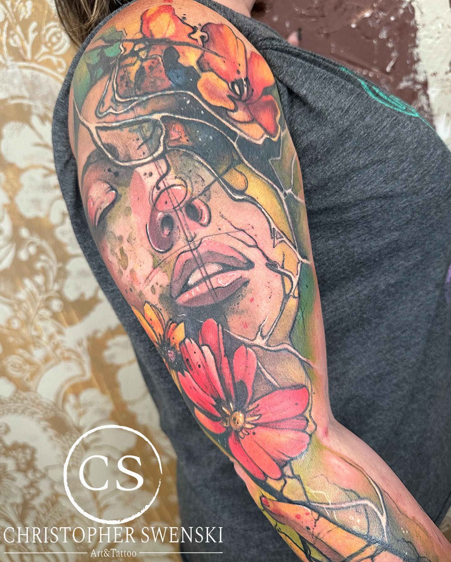 Tattoo by @chris_swenski_tattoo — watercolor, realism