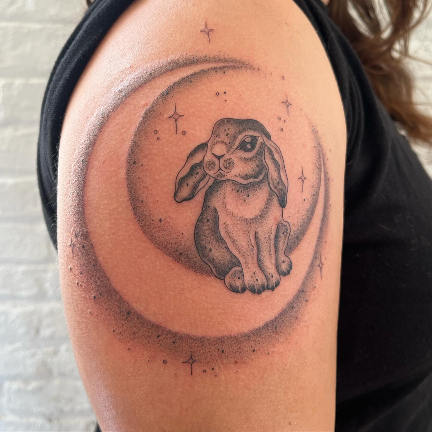 Rabbit in moon dotwork tattoo on the shoulder by 𝔇𝔢𝔰𝔦