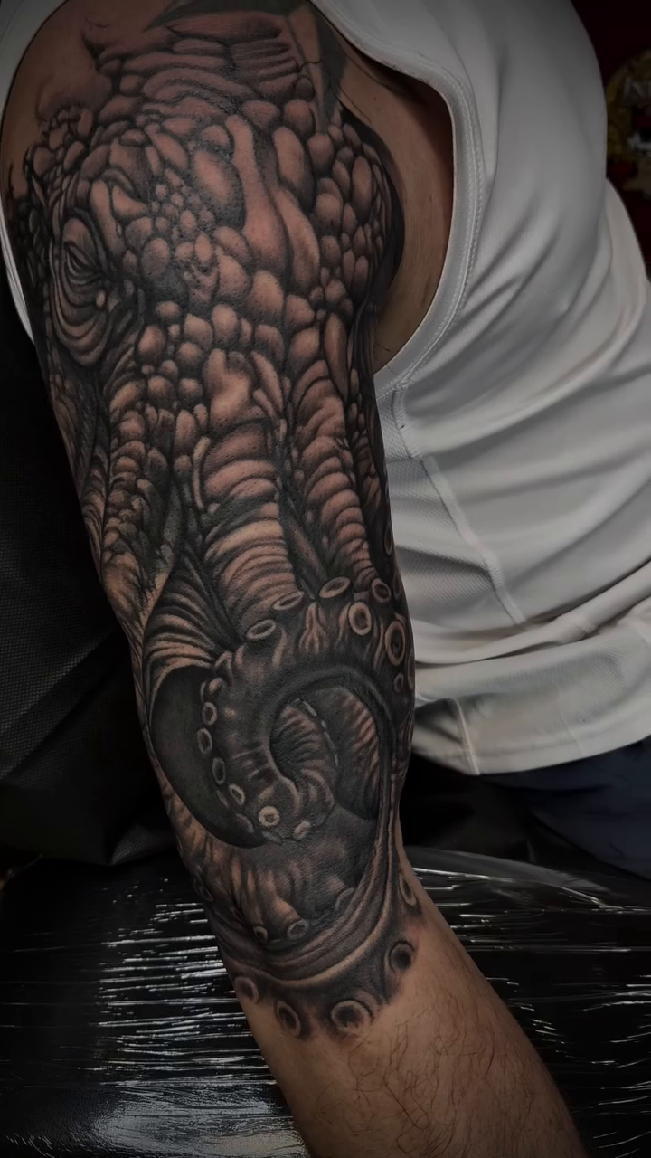 Tattoo by @artbycalib — dark_realism, black_and_grey