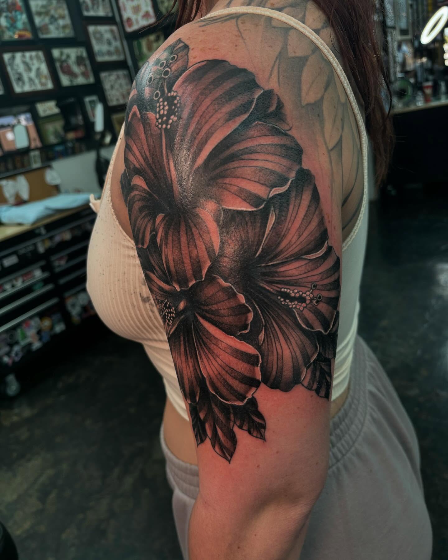 Hibiscus flower realism tattoo on the shoulder by @seibastattoos, Virginia Beach, Virginia