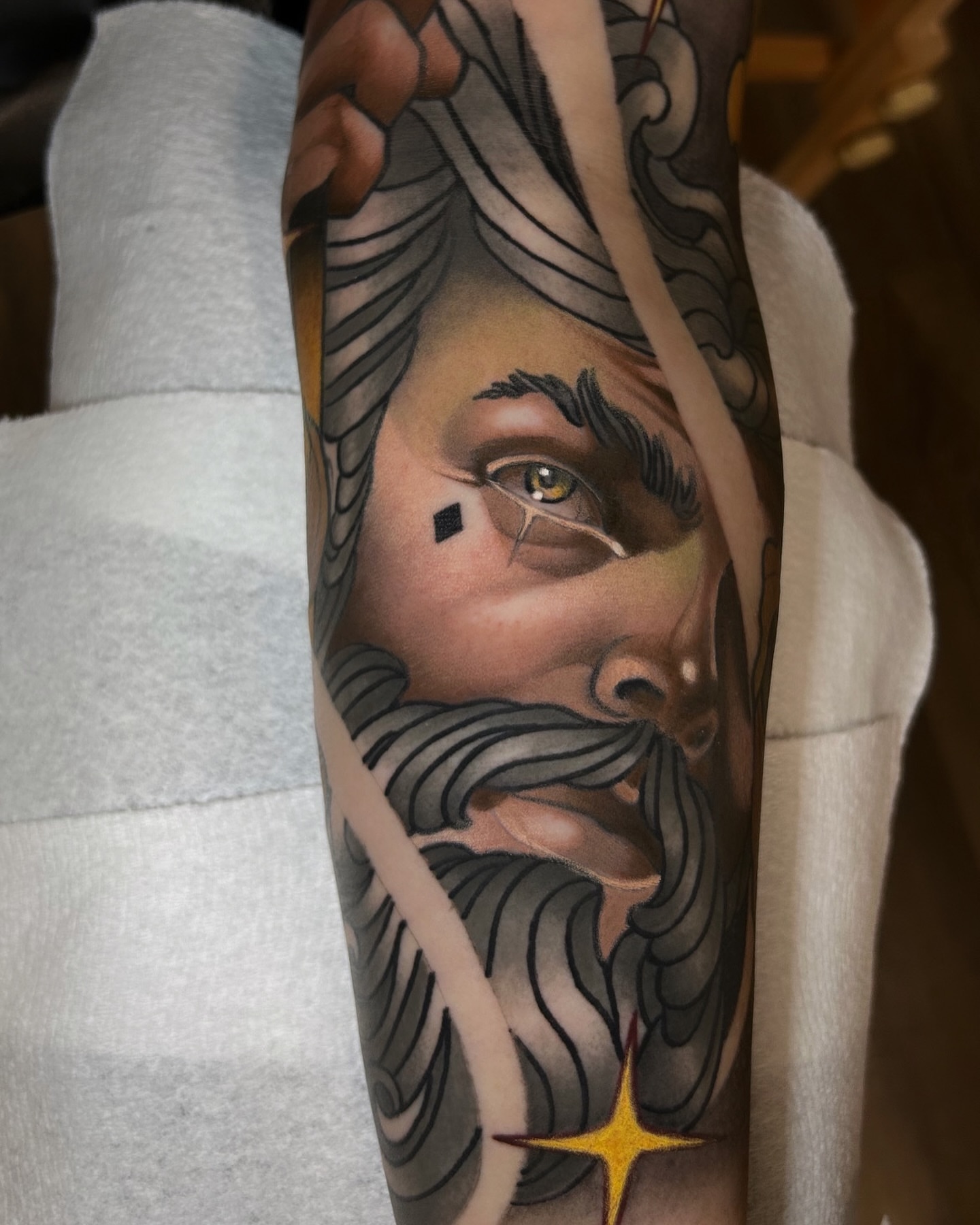 Bearded man realism tattoo on the forearm by Levi Murphy
