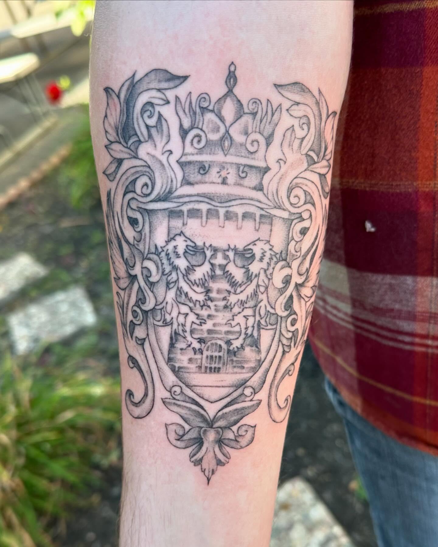 Castle and dragon realism tattoo on the forearm by Emmy