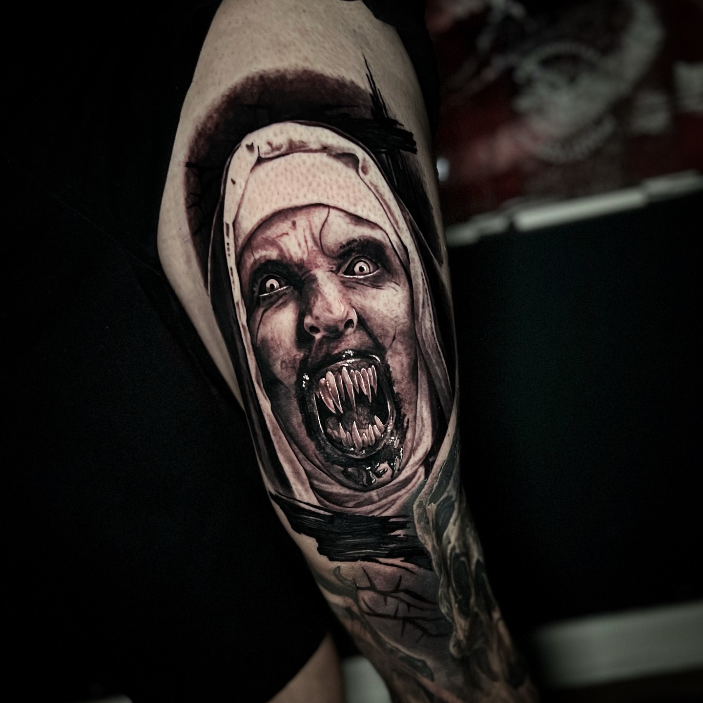 Horror figure realism tattoo on the forearm by Tucker, Maryville, Tennessee