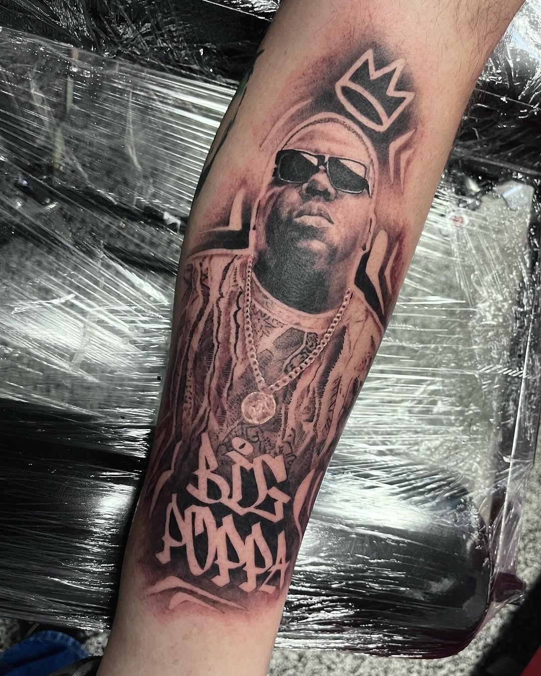 The Notorious B.I.G realism tattoo on the forearm by Jonathan Red