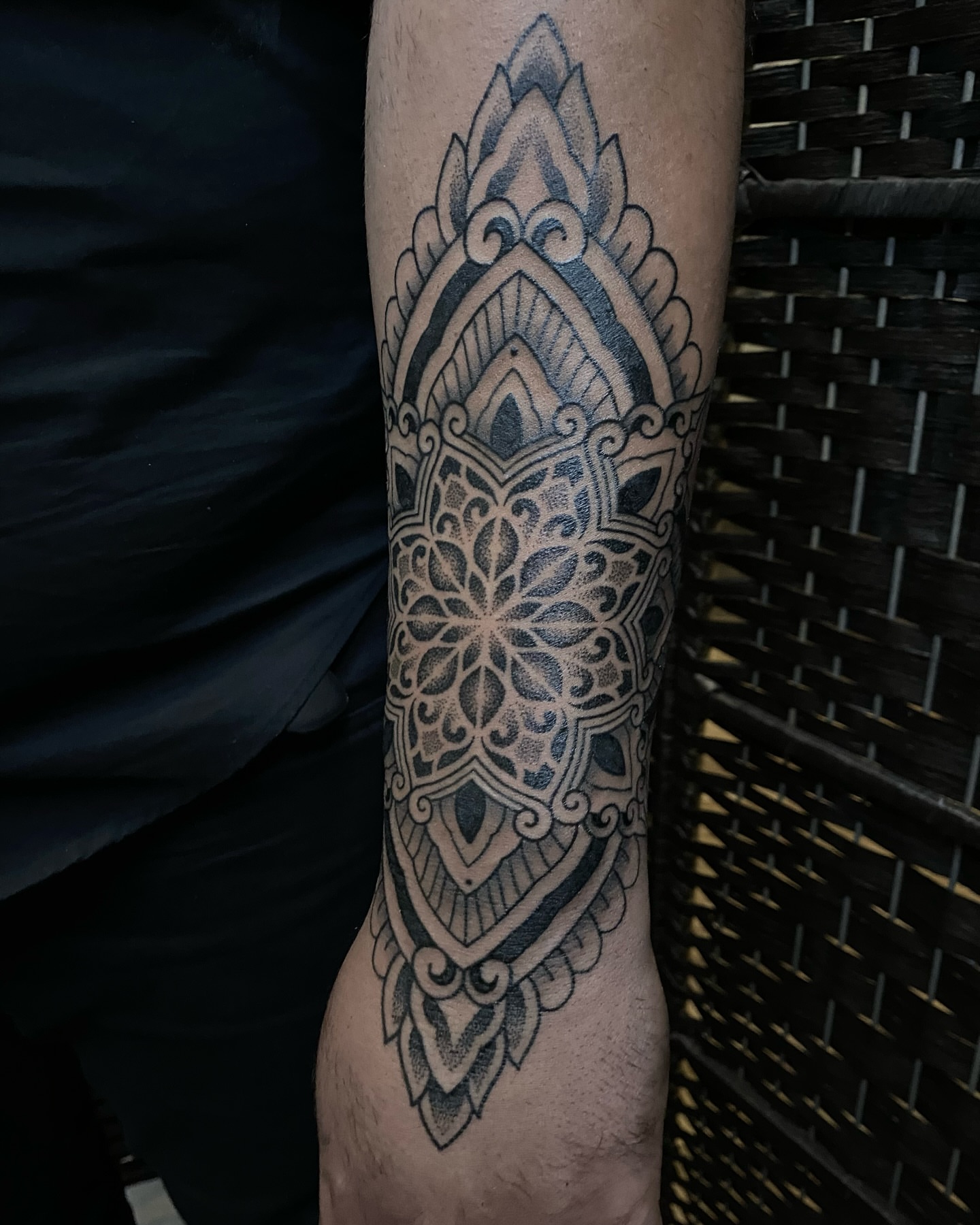 Mandala geometric tattoo on the forearm by Rose Ulinski