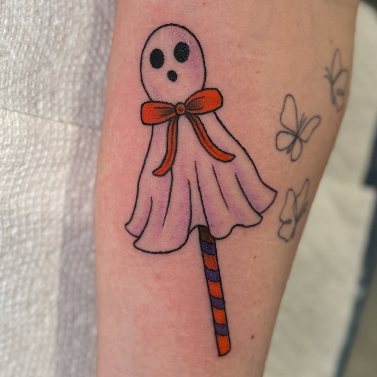 Voodoo doll new school tattoo on the forearm by Ashley Rose - Minnesota Tattoo Artist