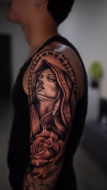 Virgin Mary with roses realism tattoo by Esto
