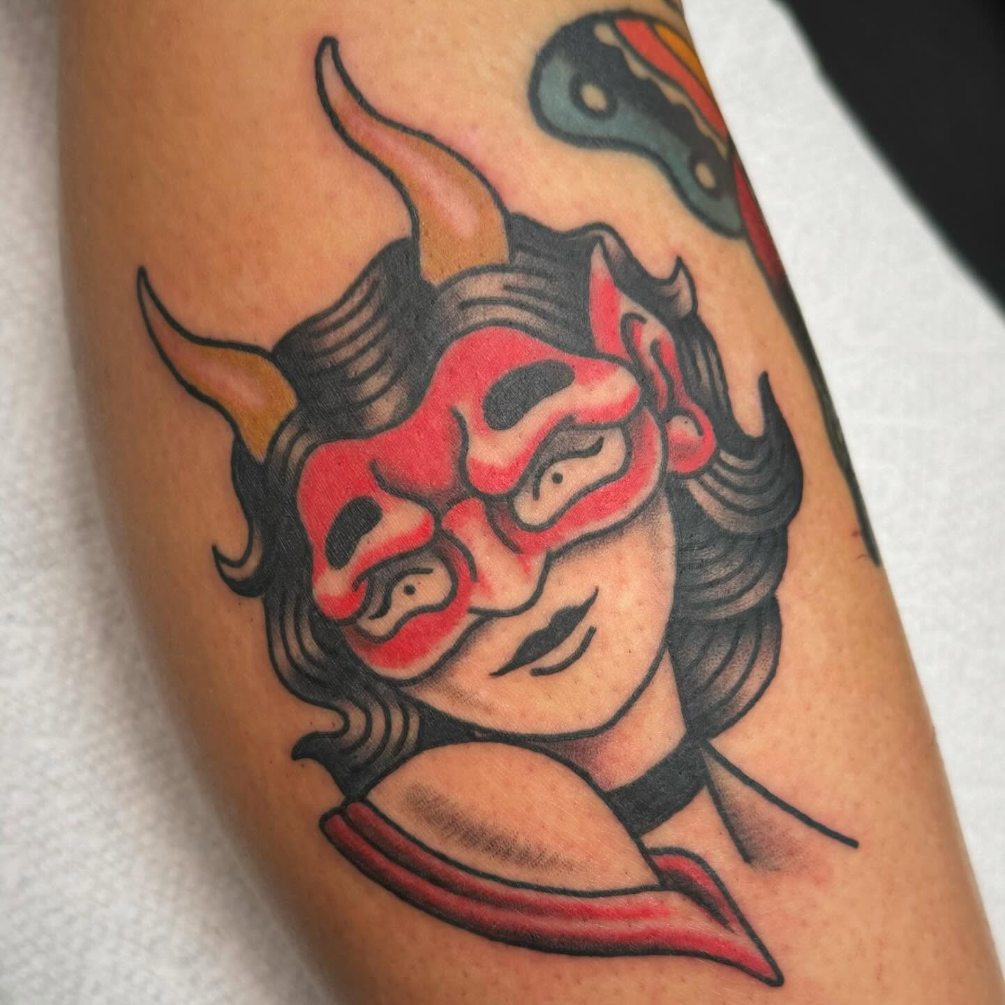 Demon mask American traditional tattoo on the forearm by David Gottschalk