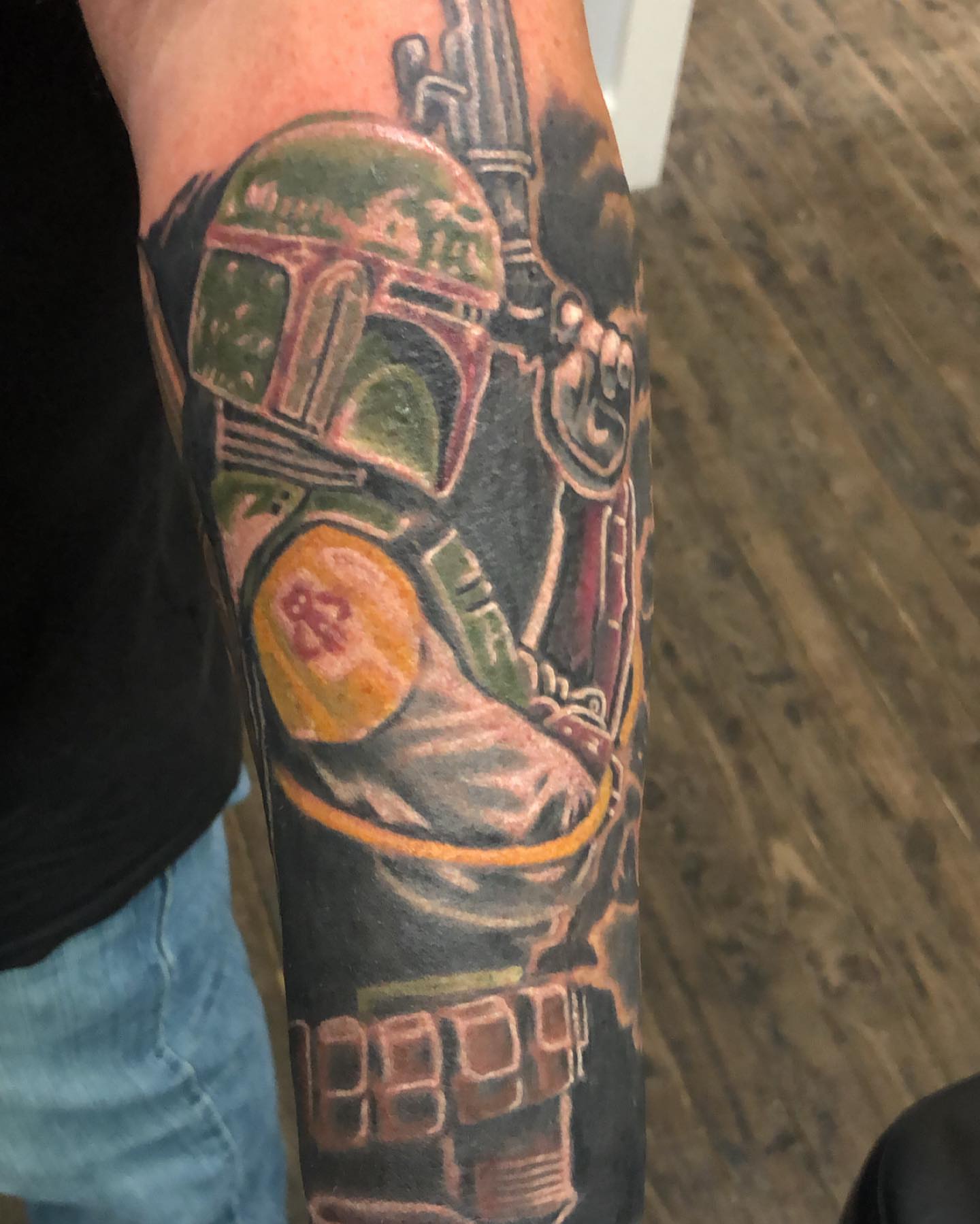Boba fett helmet realism tattoo on the forearm by A.W.