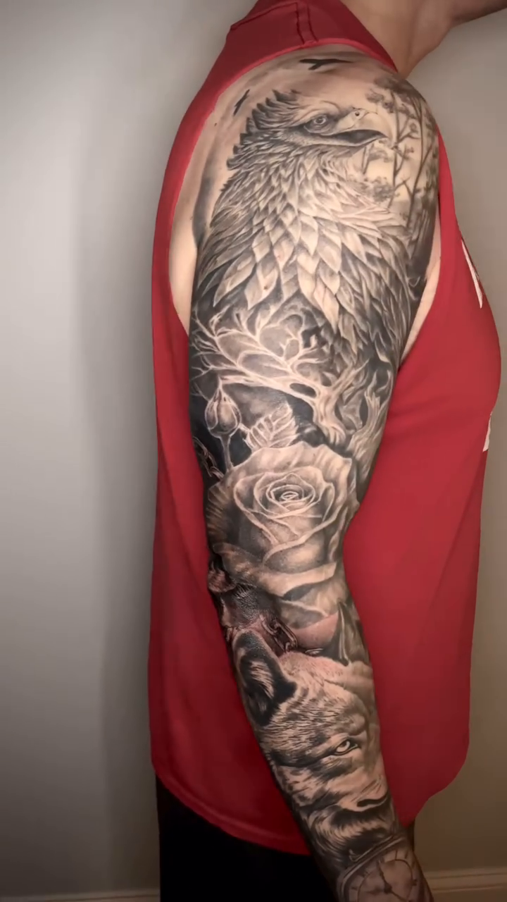 Eagle and roses sleeve realism tattoo by Charlie