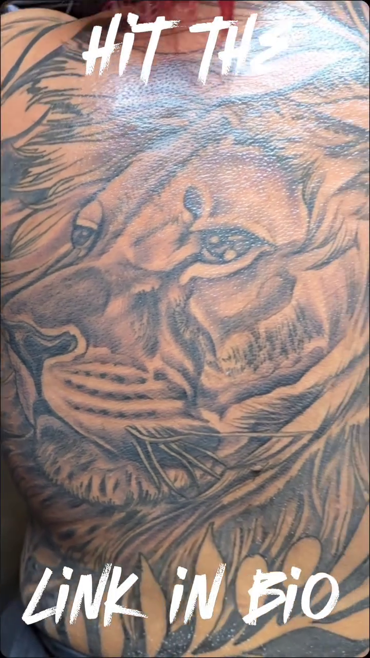 Lion portrait with floral elements realism tattoo by call (504)441-9275 for info