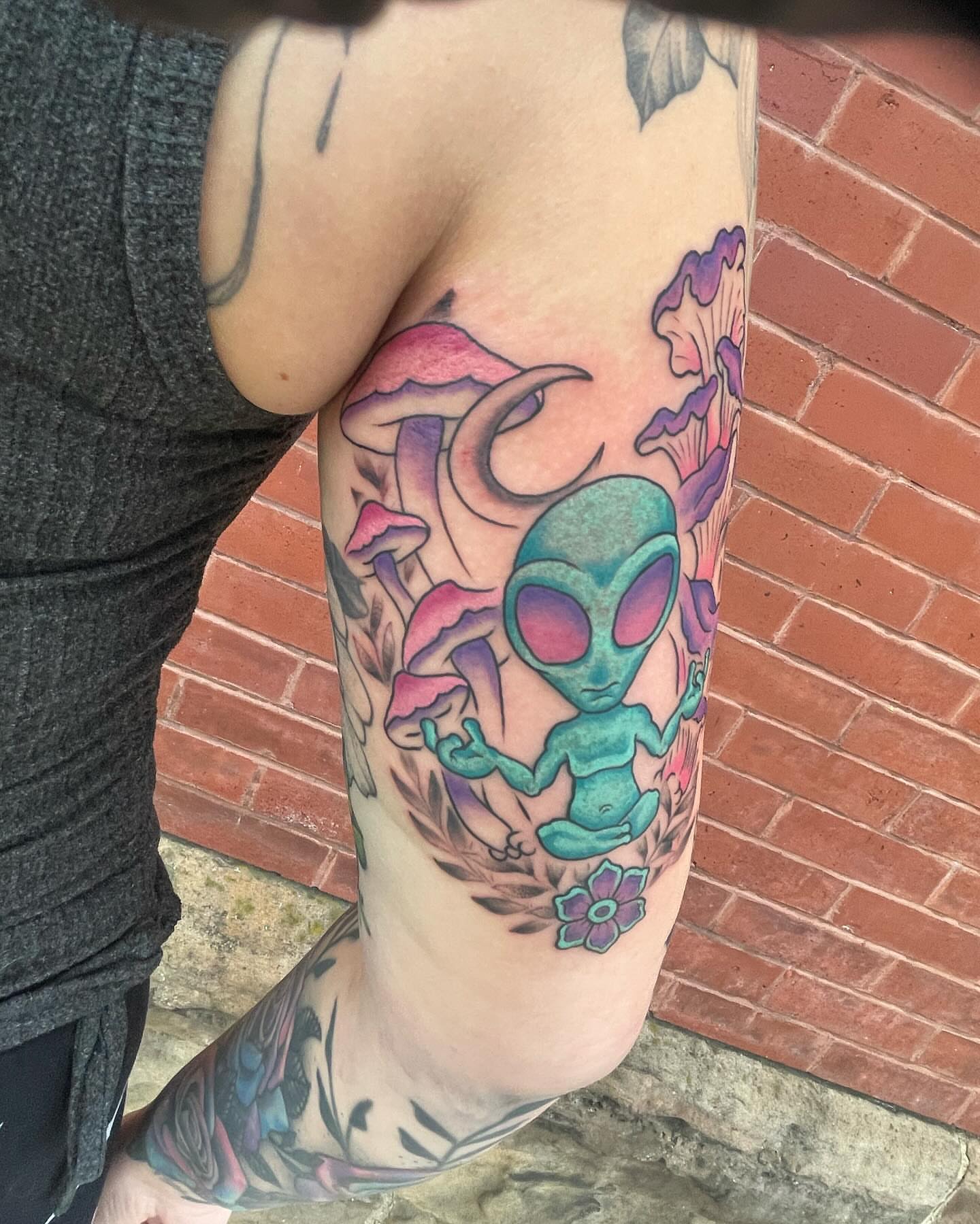 Alien meditating new school tattoo on the forearm by Auzzy the Ink Pirate, Mansfield, Ohio