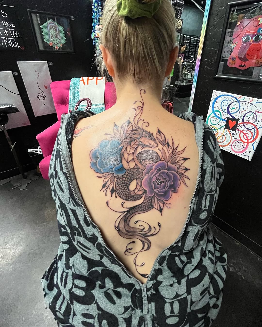 Dragon and flowers watercolor tattoo on the back by Vegas Val LadyTattooArtist 💚