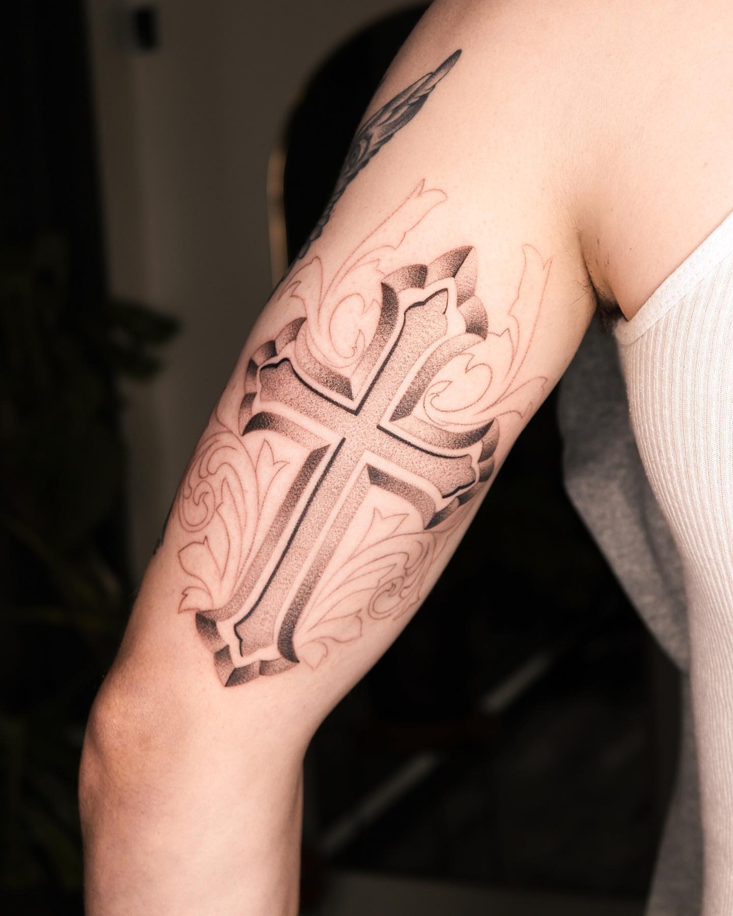 Cross dotwork tattoo on the forearm by Beans