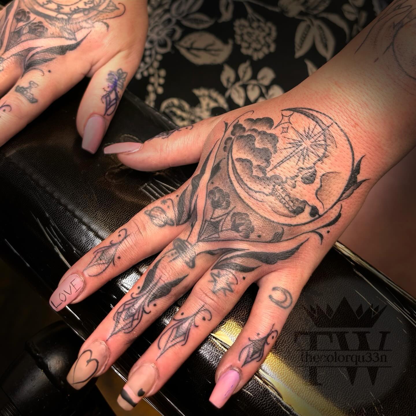 Skull and floral realism tattoo on the hand by Taylor Tha Color Queen