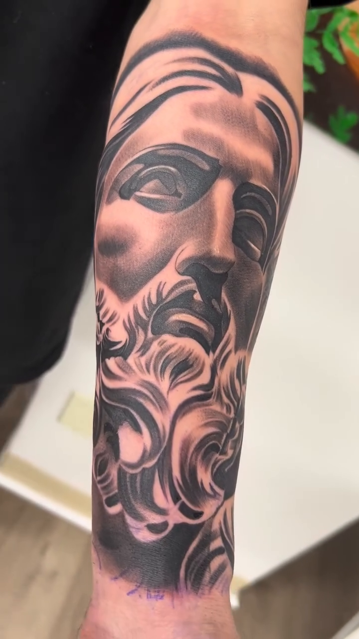 Jesus Christ portrait realism tattoo by Isaac Barrientos