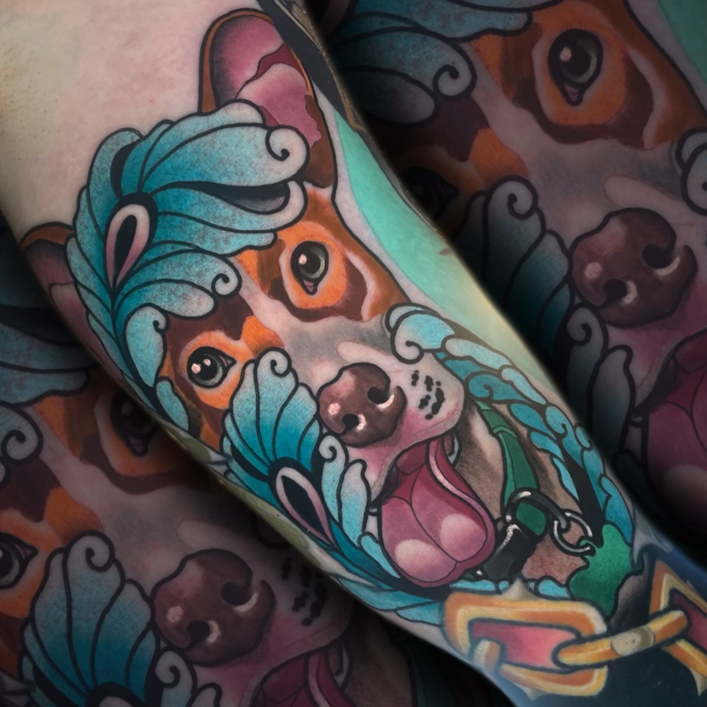 Dog with waves American traditional tattoo on the forearm by Nathan Mickle