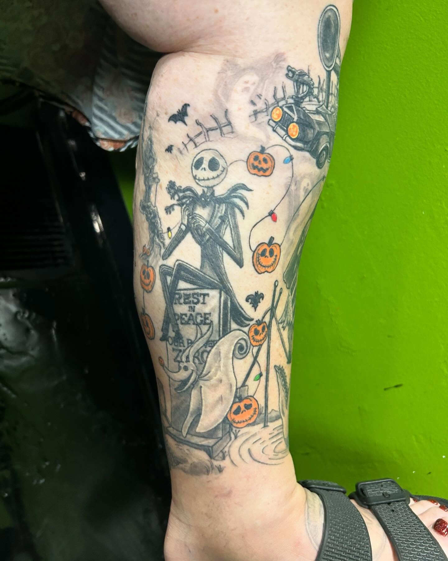 The nightmare before christmas black and grey tattoo on the forearm by B Hendrix, Cuyahoga Falls, Ohio