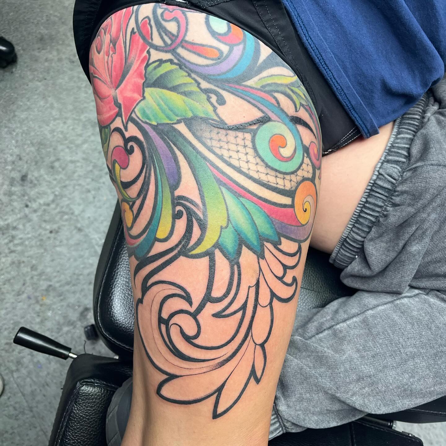 Floral design ornamental tattoo on the thigh by scottyjstattoos