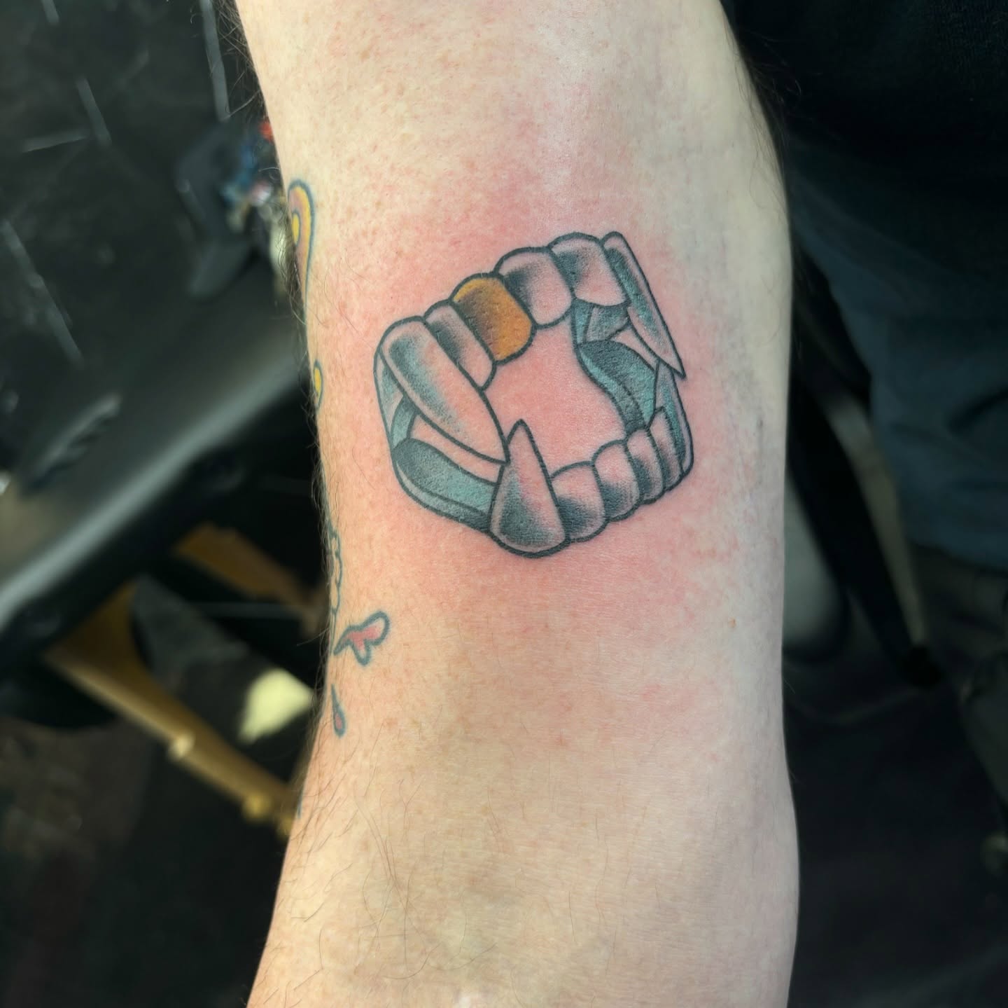 Fist American traditional tattoo on the forearm by Jordan Wray