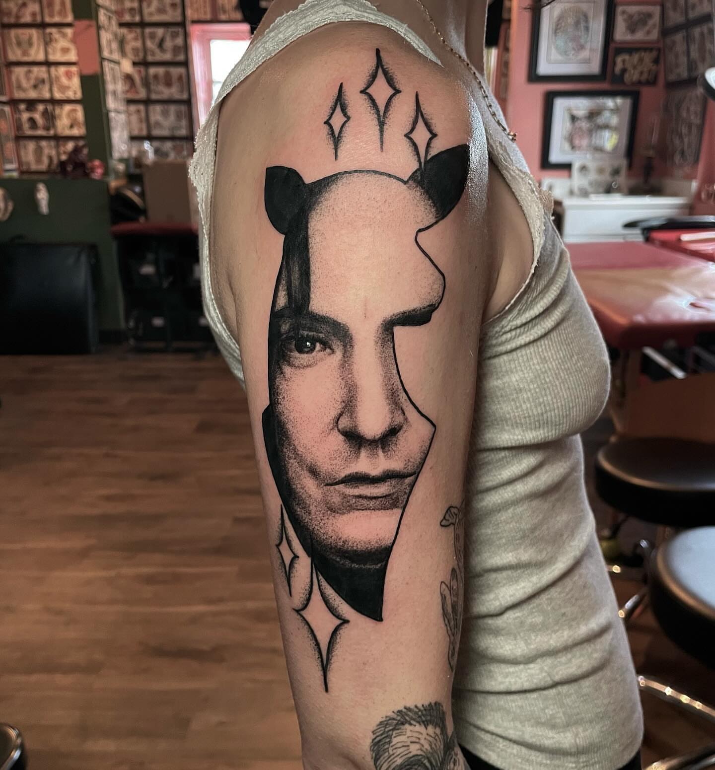 Portrait dotwork tattoo on the forearm by Ian Spong