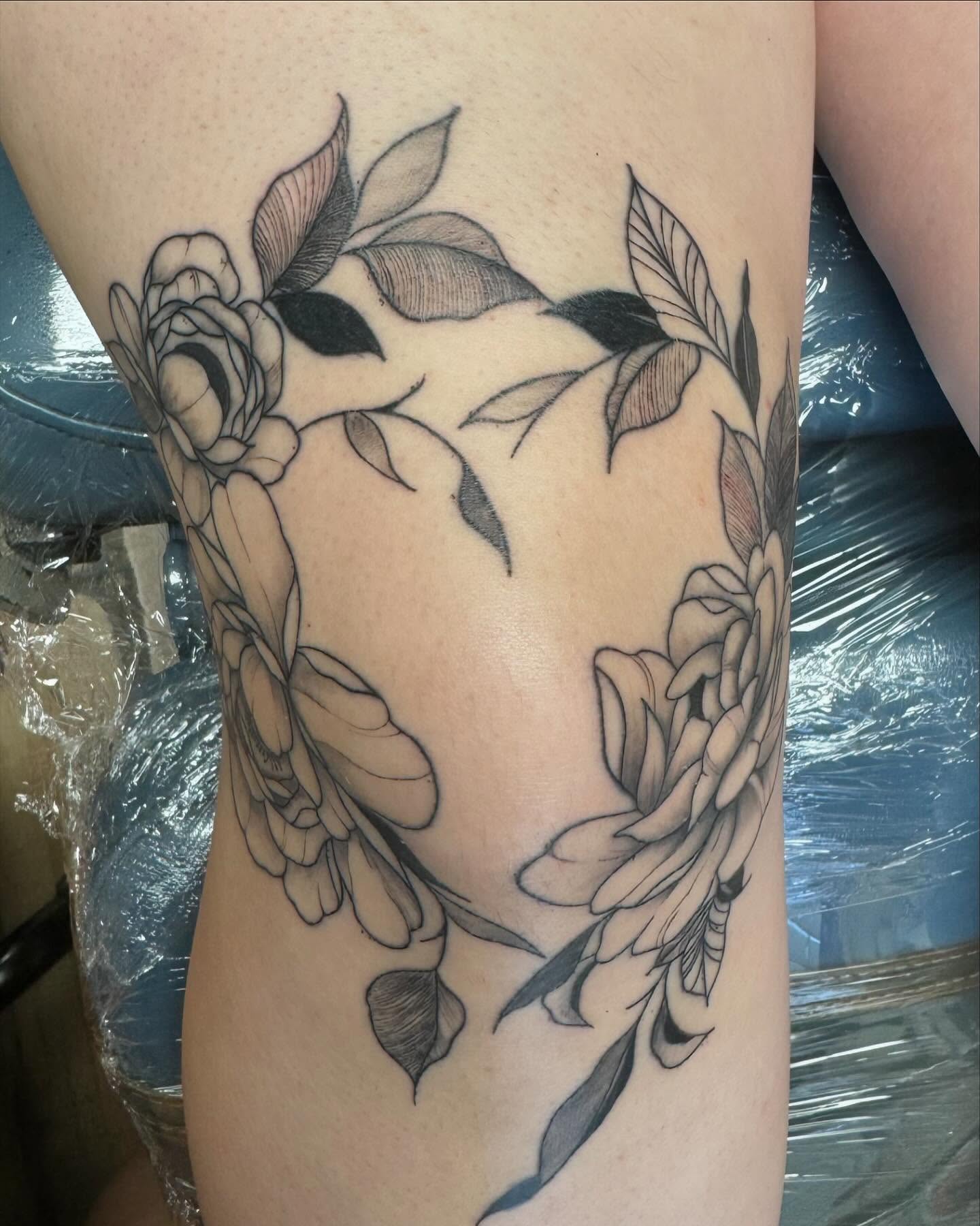 Peonies black and grey tattoo on the thigh by Mickey