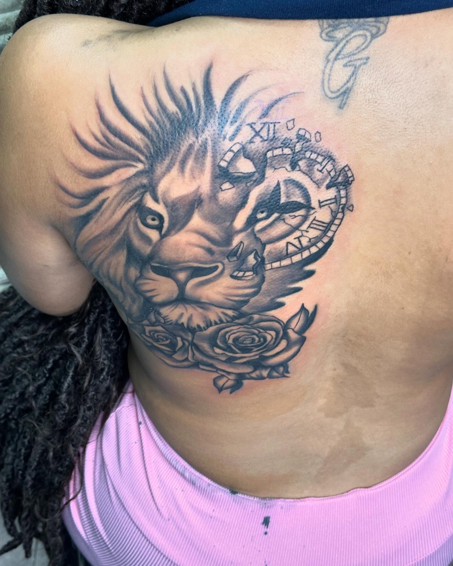 Lion and clock realism tattoo on the ribs by Mr. Tatt2Junkiee 💉🧟