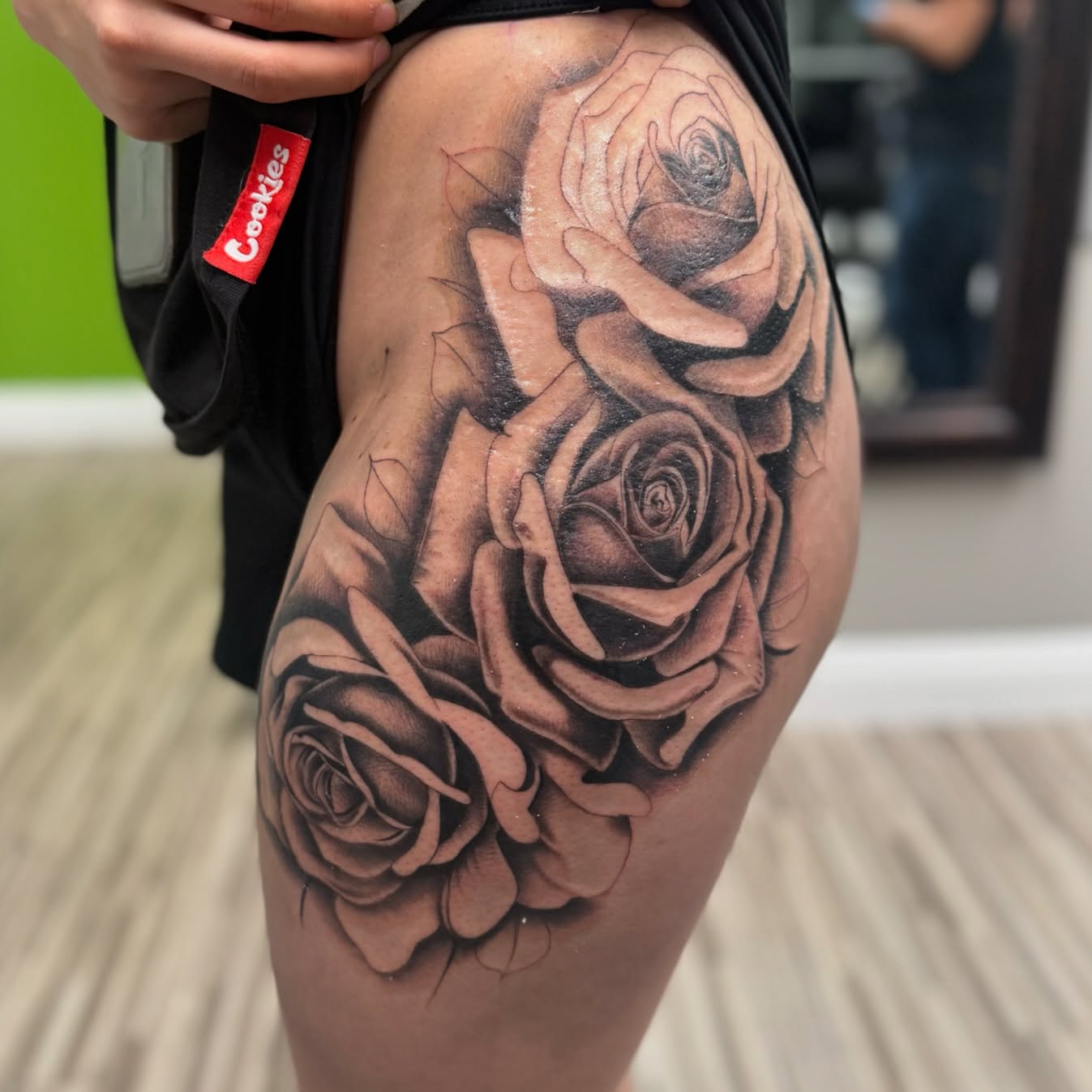 Roses black and grey tattoo on the thigh by Angel Pineda-Rodriguez