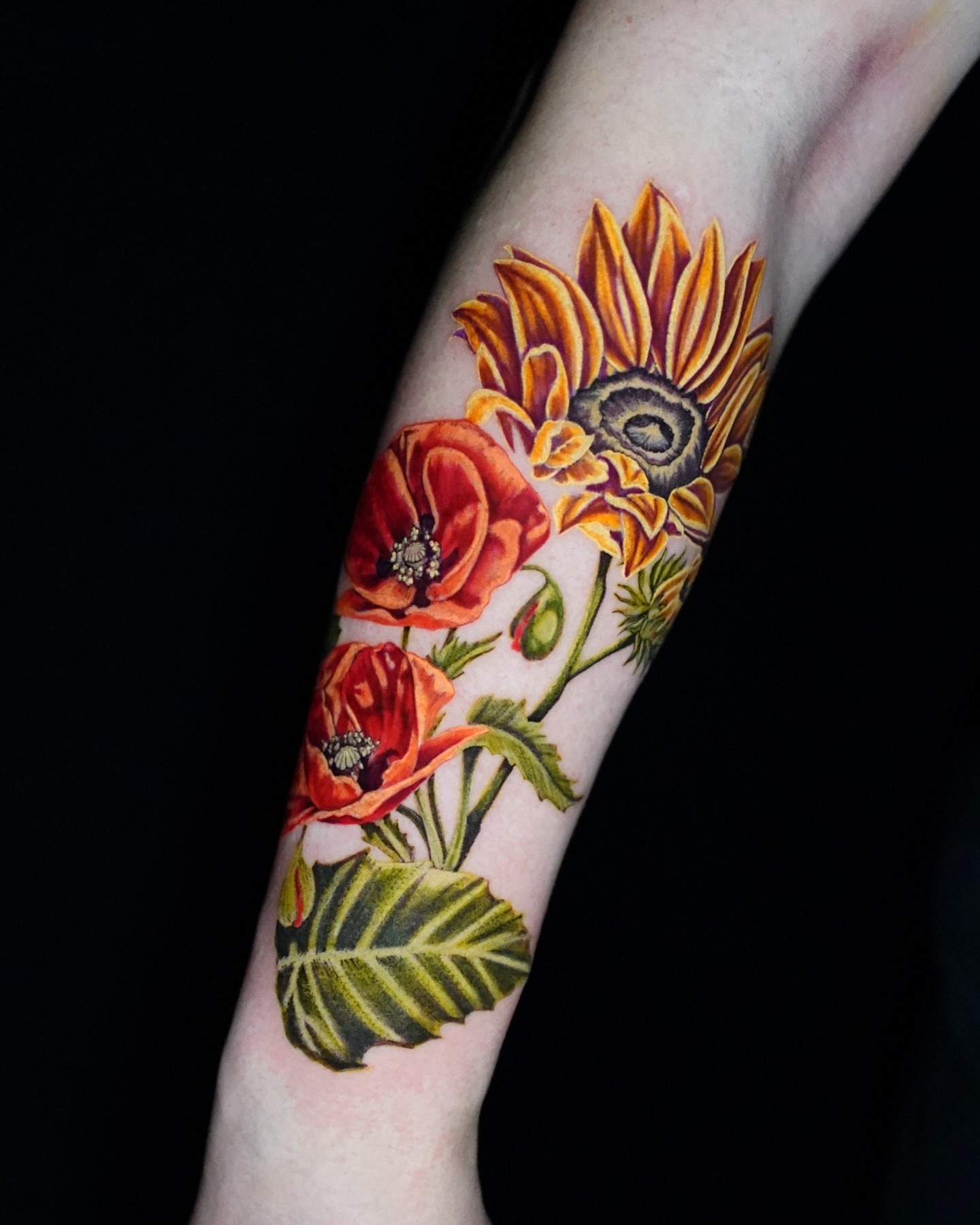Sunflower and poppies realism tattoo on the forearm by Shar - Utah Tattoo Artist