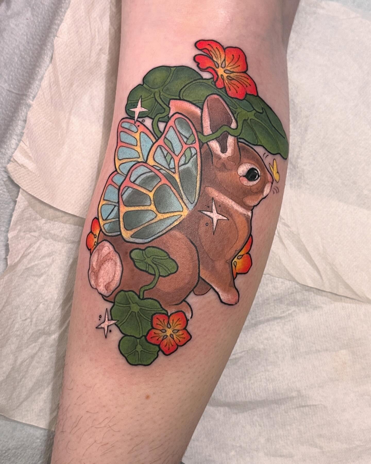 Bunny with butterfly wings new school tattoo on the forearm by Claire Evans, San Francisco, California