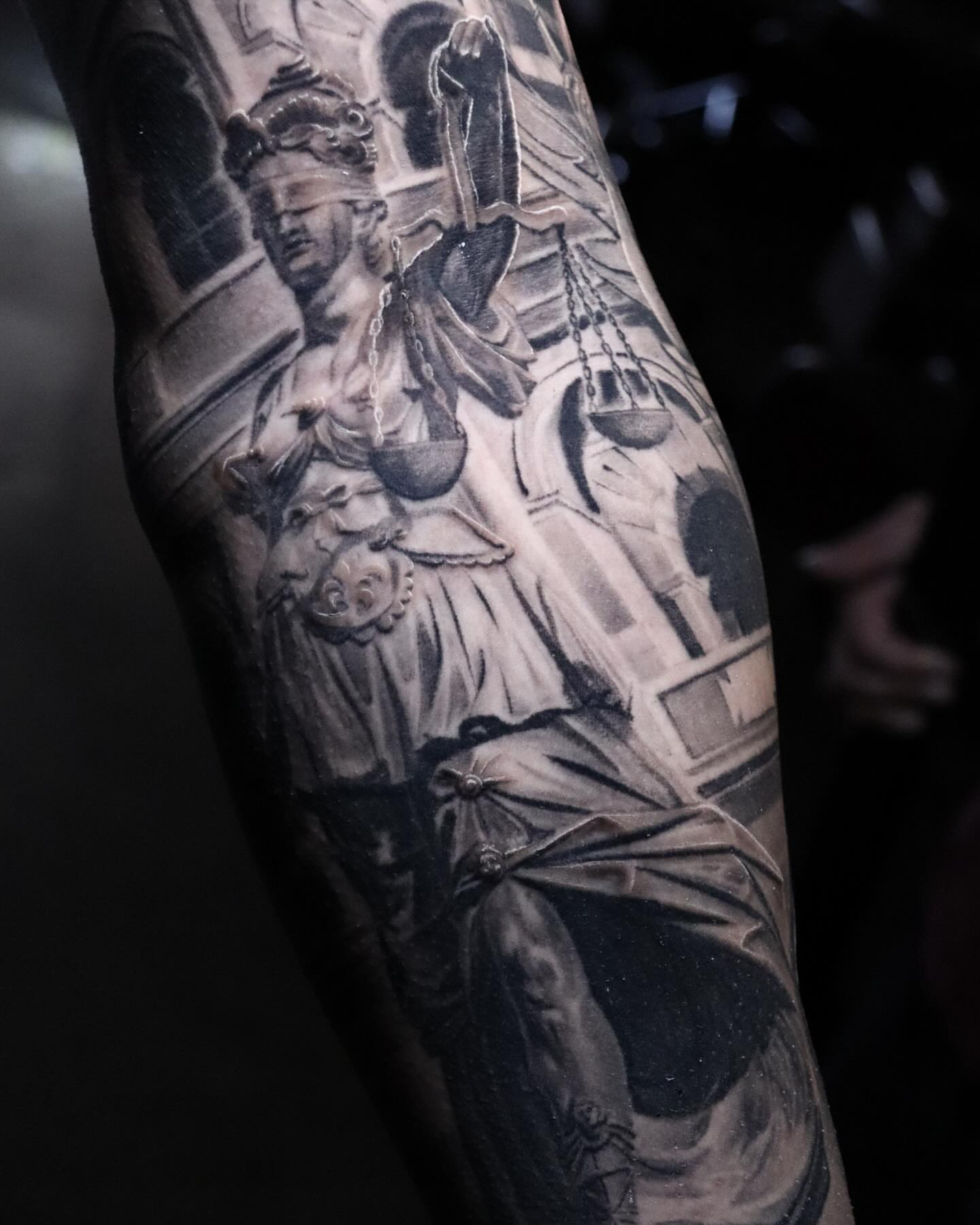 Lady Justice realism tattoo on the forearm by Christian Medina, Sacramento, California