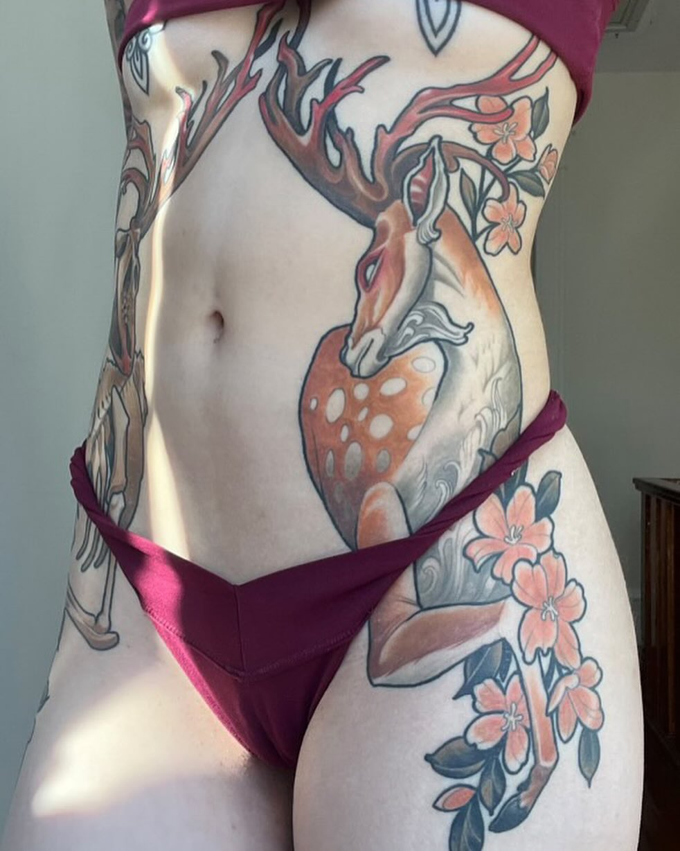 Deer and flowers realism tattoo on the torso by Matt - Neotrad Tattoos, New York, New York