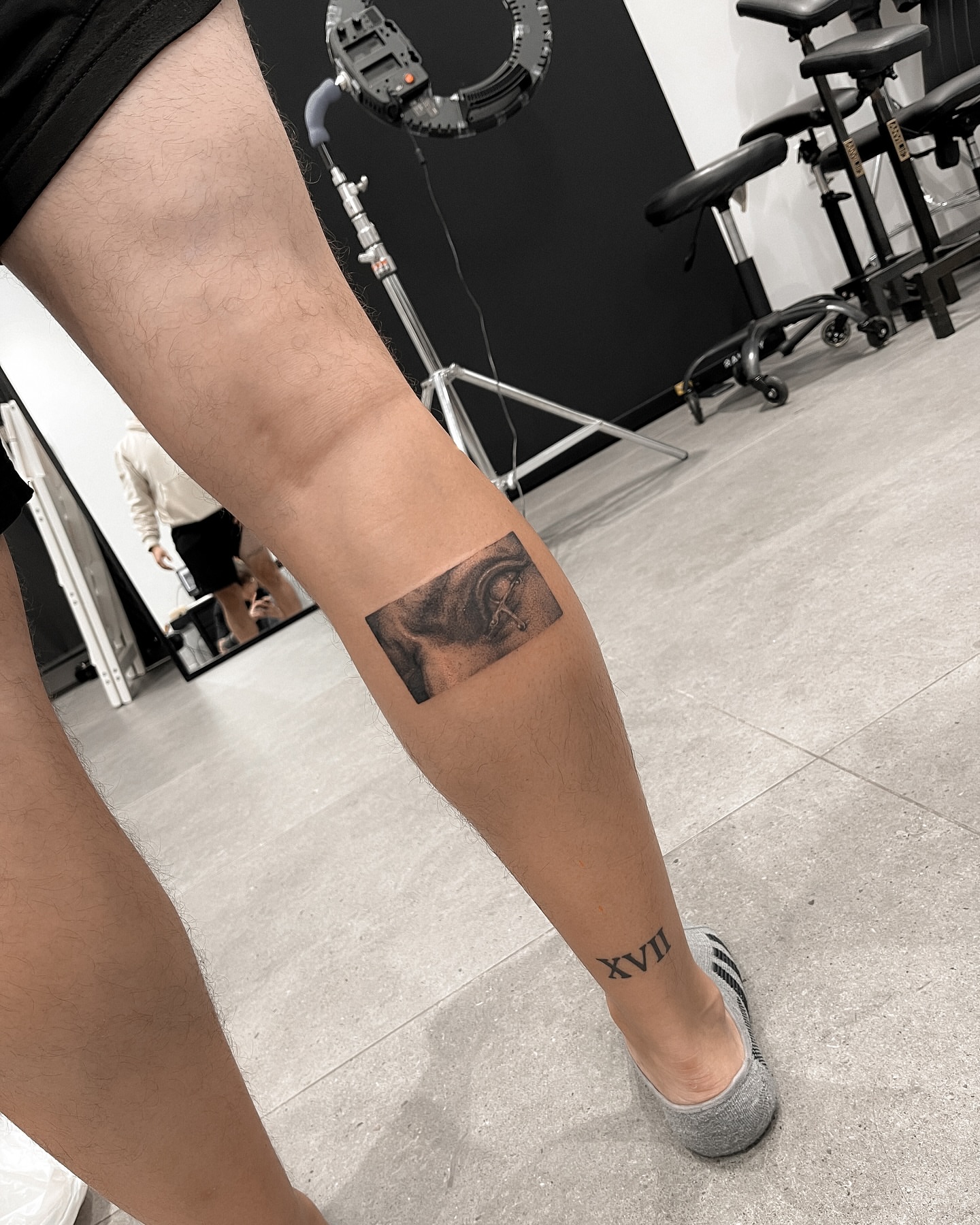 Eye black and grey tattoo on the forearm by Grace Zarmina Hessam