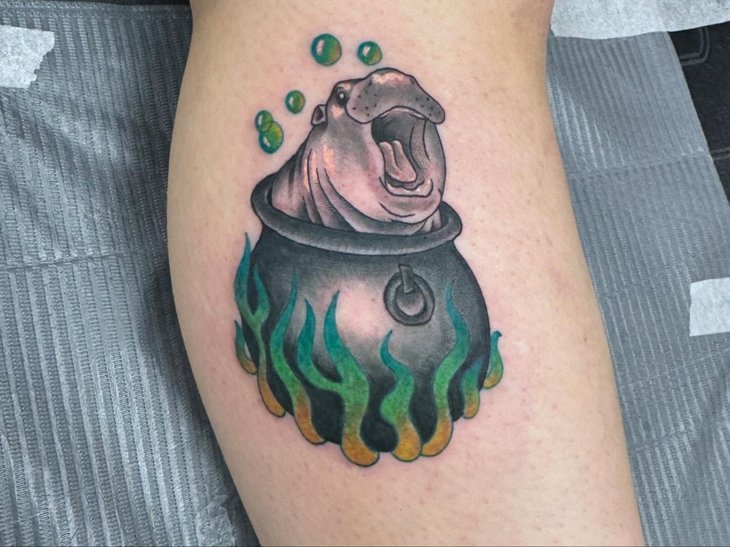 Hippopotamus in pot realism tattoo on the thigh by McKenna Chalifoux