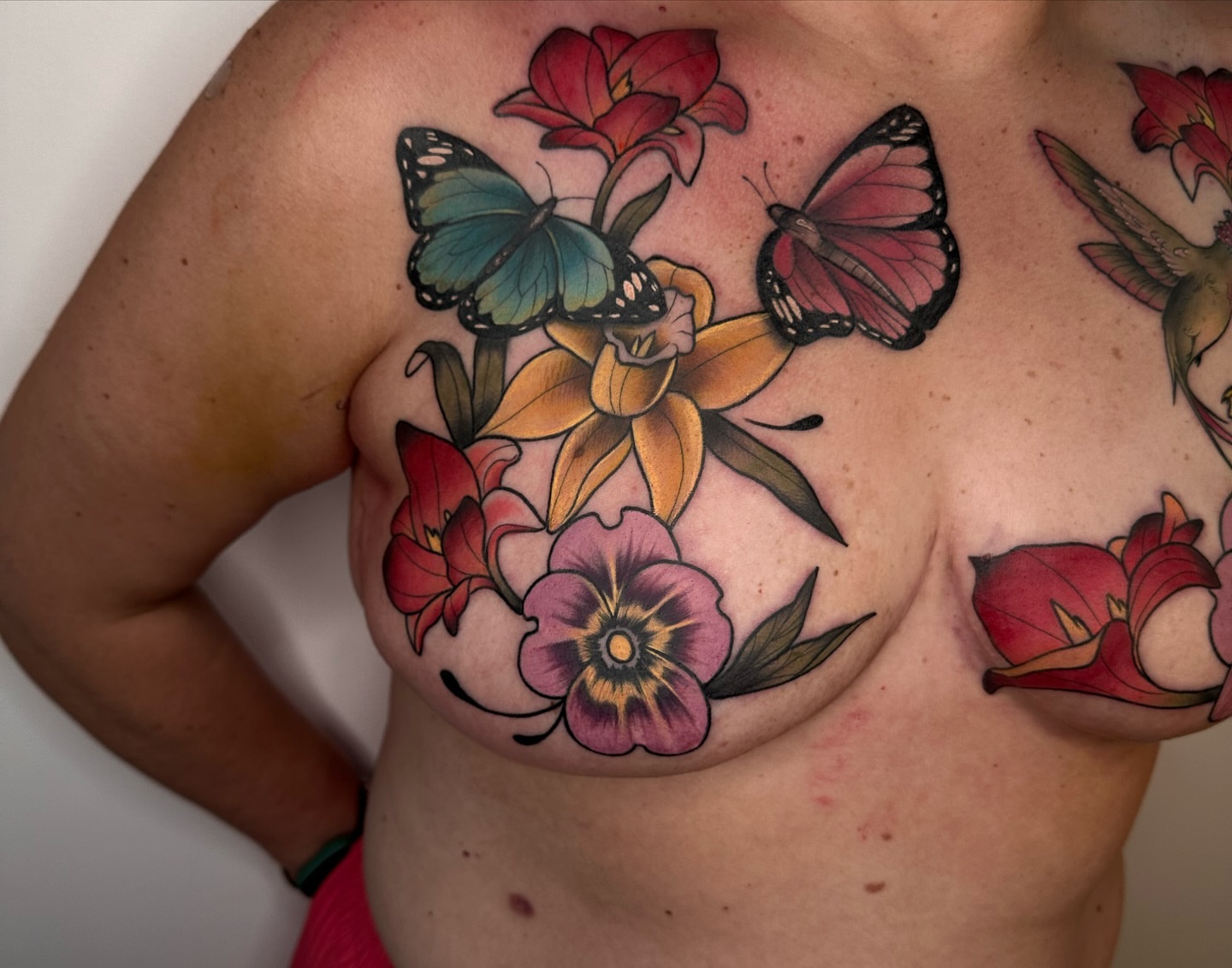 Flowers and butterflies realism tattoo on the chest by alex h🪴 neotrad