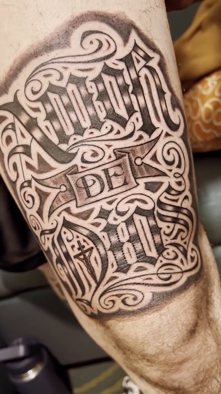 DEK lettering script tattoo by F e A R