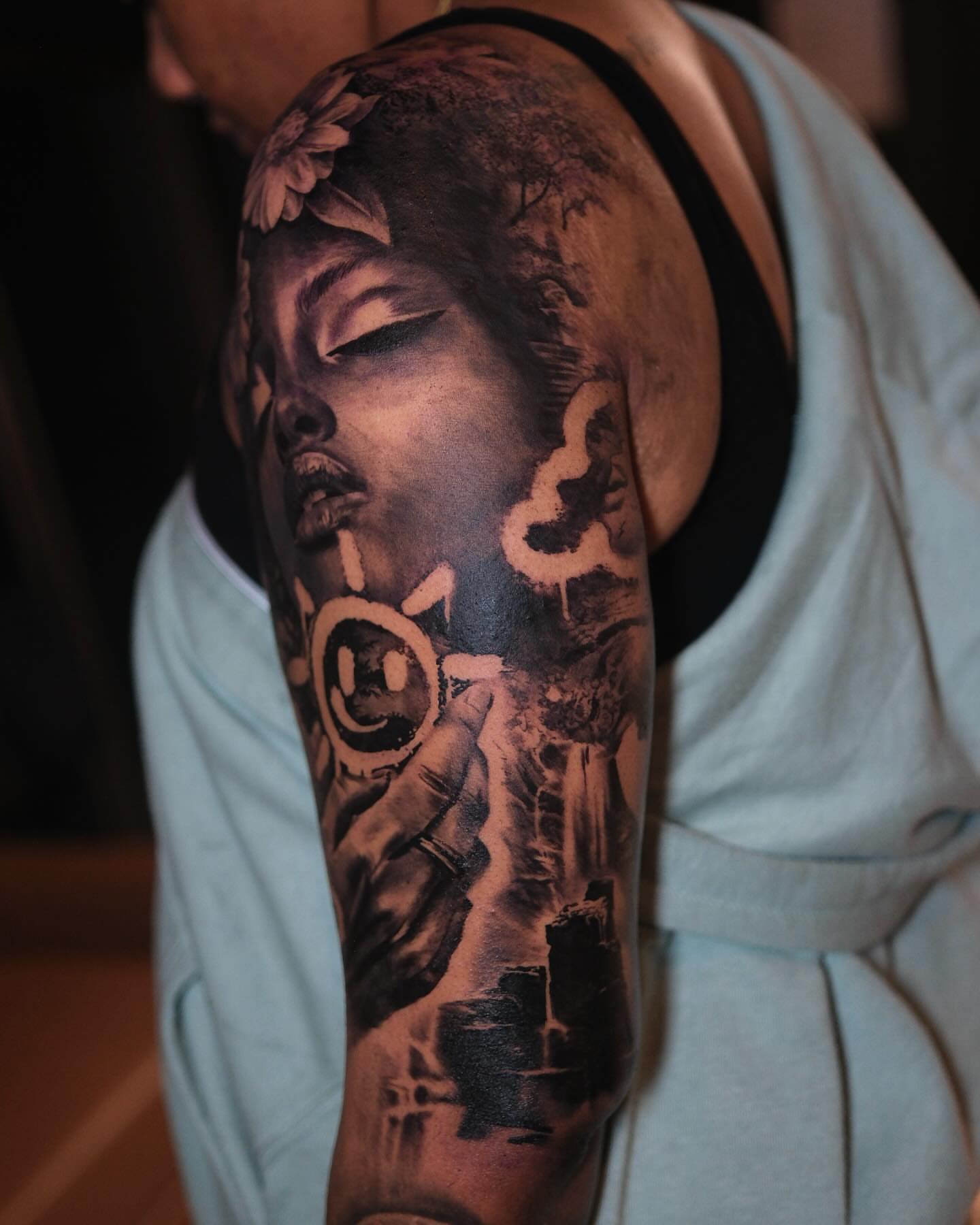 Woman's face realism tattoo on the upper arm by Joel: Boston Tattoo Artist, Boston, Massachusetts