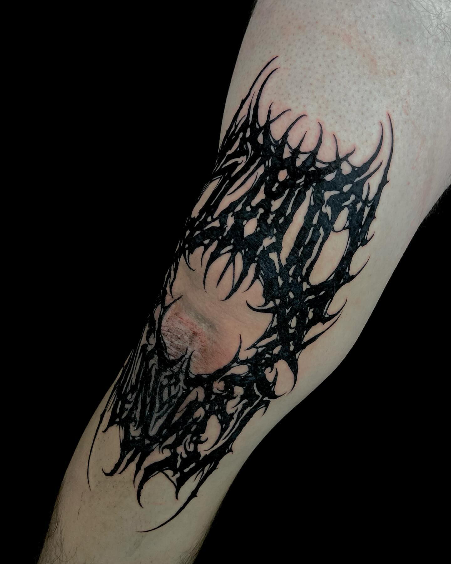 Abstract design blackwork tattoo on the forearm by Nathan