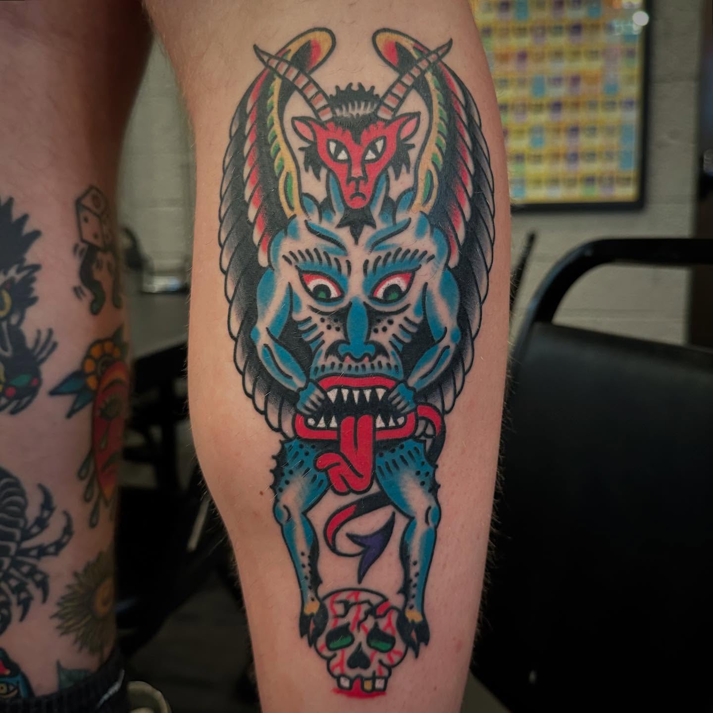 Demon American traditional tattoo on the forearm by Isaac Brethauer