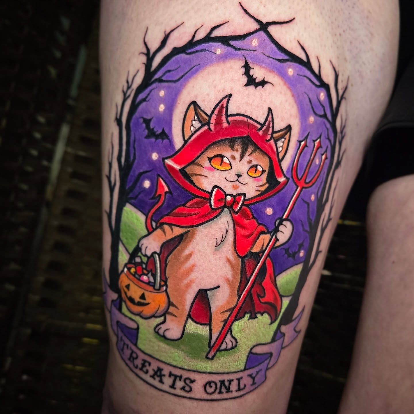 Cat in devil costume new school tattoo on the forearm by @lovelornpotato