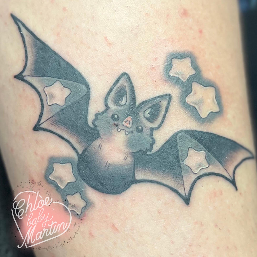 Bat black and grey tattoo on the forearm by Chloe ‘baby’ Martin