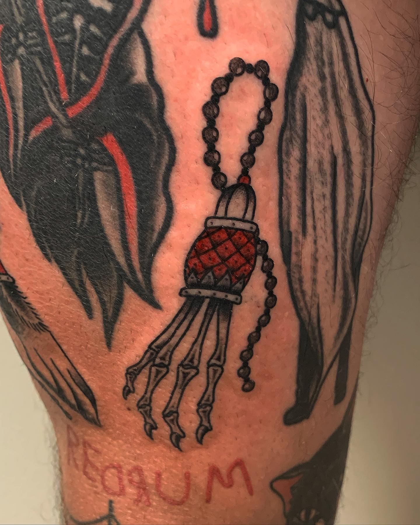 Red pocket watch neo-traditional tattoo on the forearm by Brii Moser