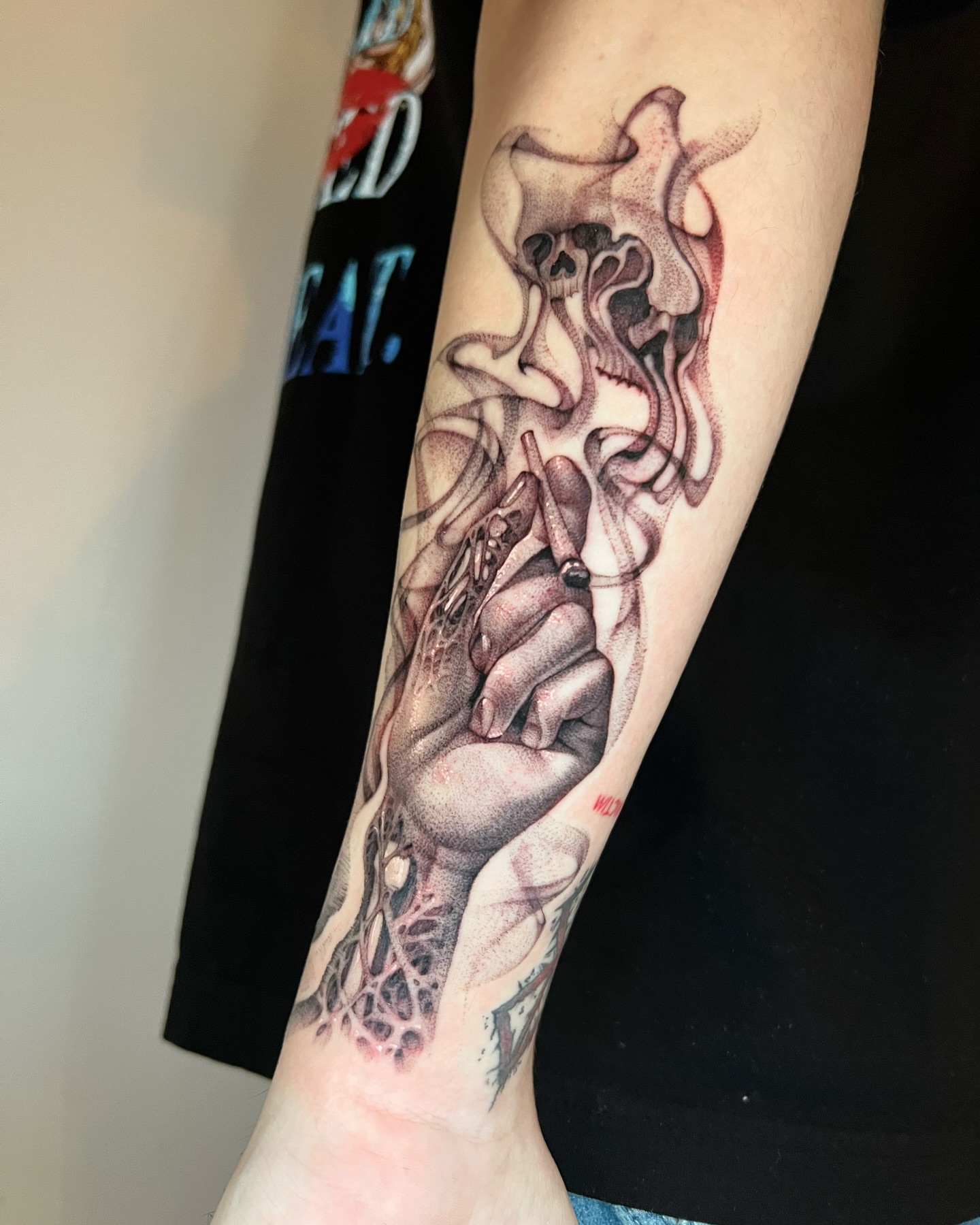 Smoking hand realism tattoo on the forearm by ๐ค ๐๐๐๐๐๐ ๐ค