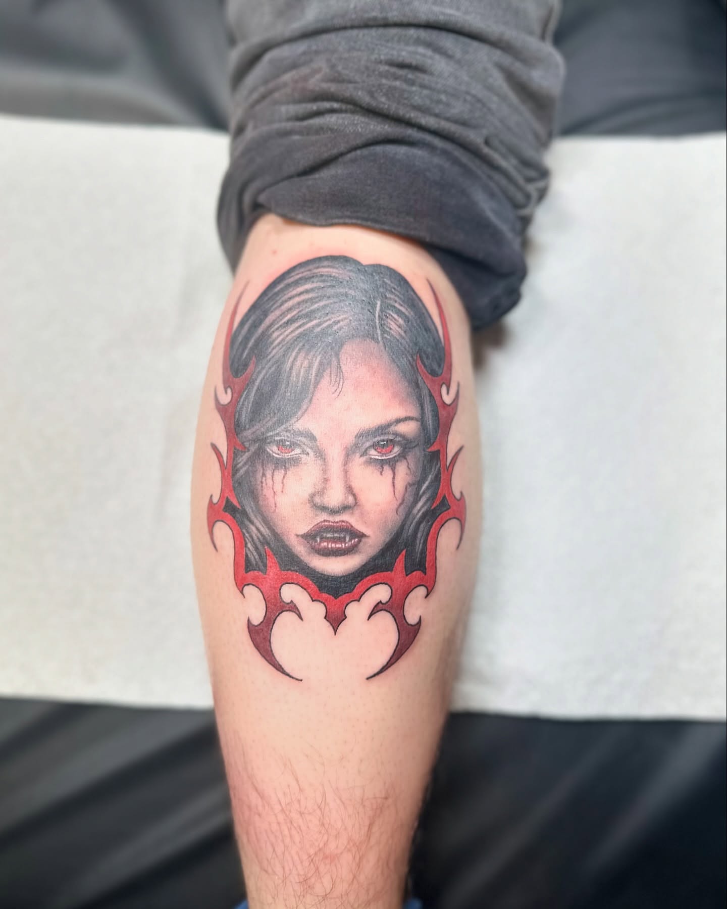 Woman's face realism tattoo on the forearm by (Joshua) Van Cummings