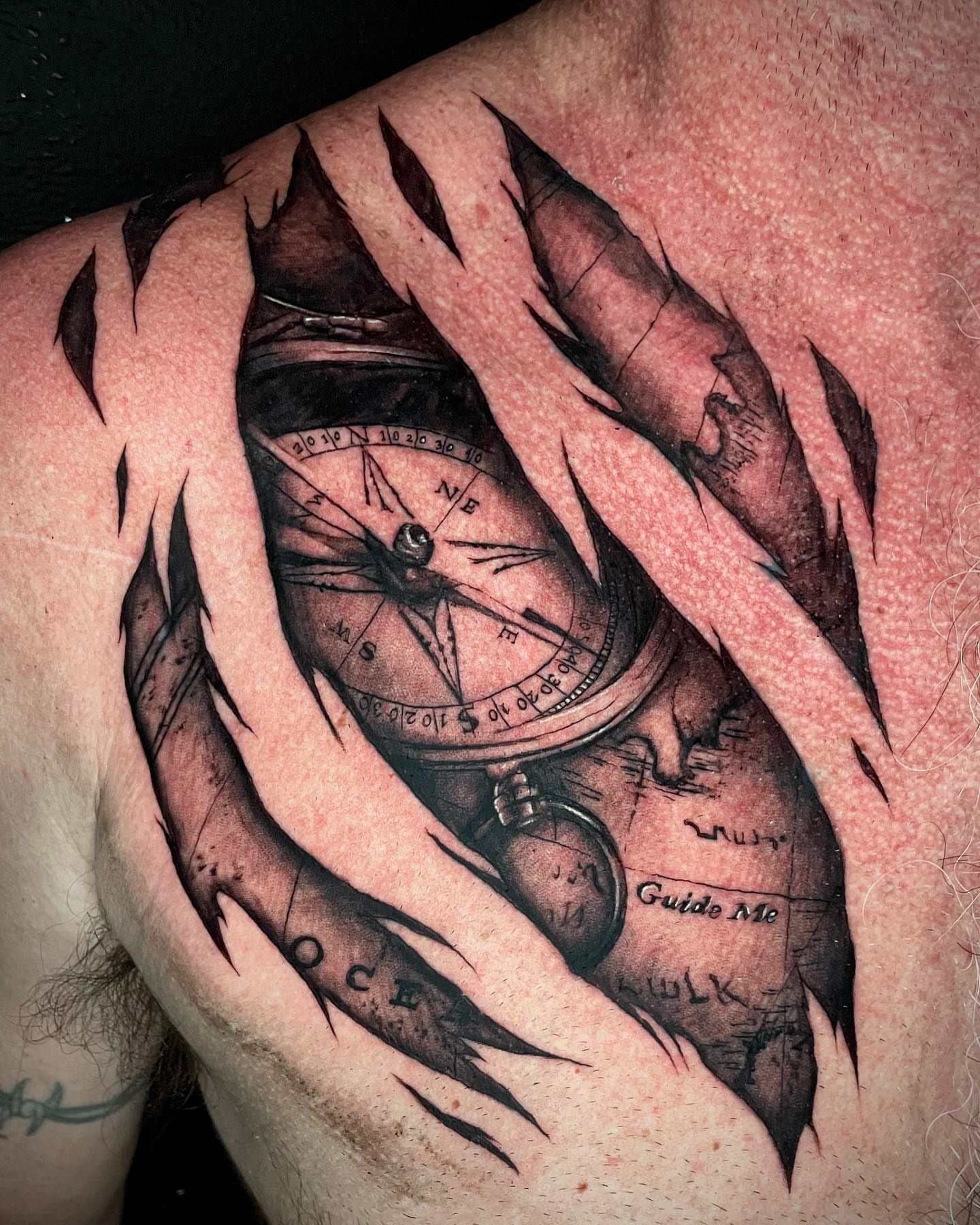 Compass and map realism tattoo on the shoulder by Bryce Presley, Mission, Kansas